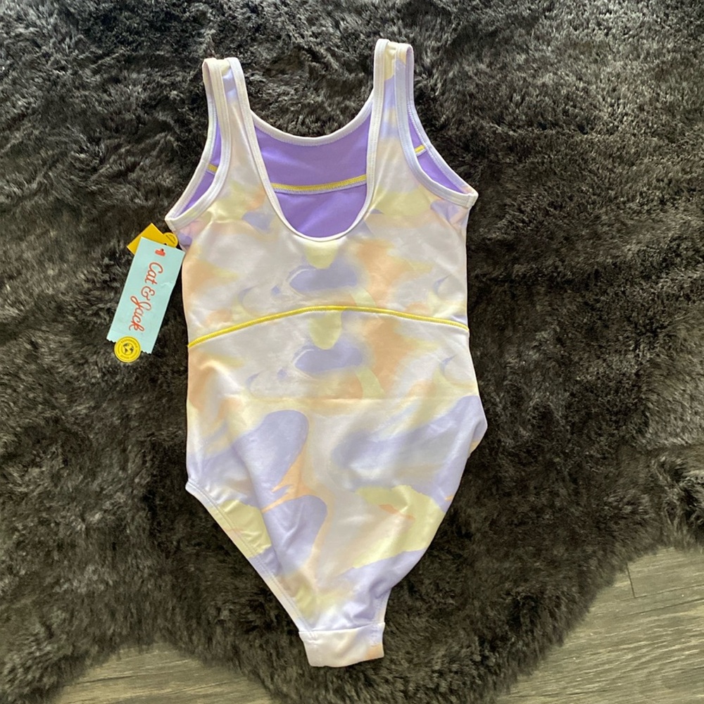 Brand new kid (small 6/7) bathing suit, never been worn and tag still attached.